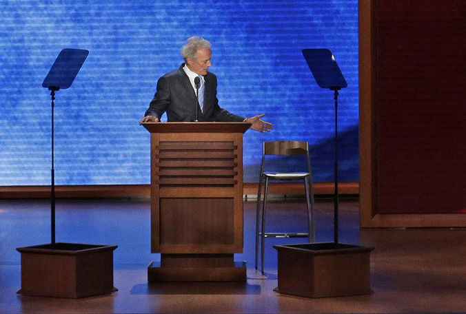 Clint Eastwood has a conversation with an empty chair mocking the 16 empty chairs at the Trouble with The Curve premiere