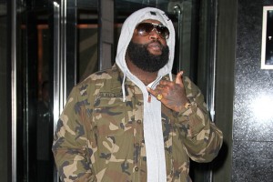 Rick Ross spotted wearing a red sneakers while leaving his hotel in New York City