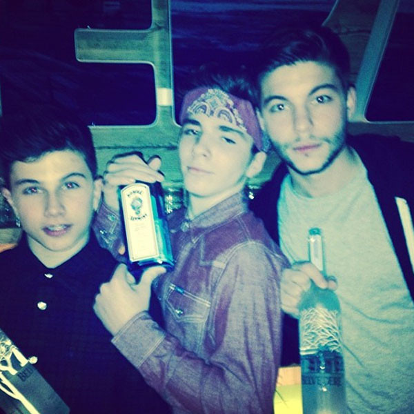 madonna-causes-controversy-for-posting-a-picture-of-her-son-rocco-13-holding-a-liquor-bottle-news-0106-1