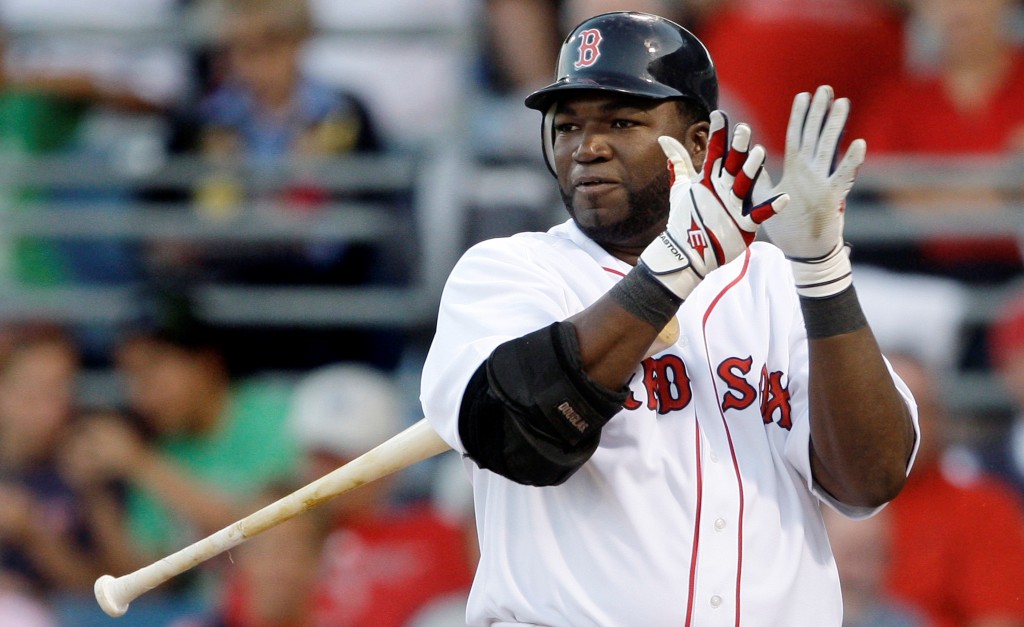 Boston Red Sox designated hitter David Ortiz, in his first game back since playing in the World Baseball Classic, claps his hands as he steps into the batter's box to face the New York Yankees during a spring training baseball game in Fort Myers, Fla., Friday, March 13, 2009. (AP Photo/Charles Krupa)
