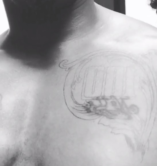 Stevie-j-removes-tattoo-chest-0917-3