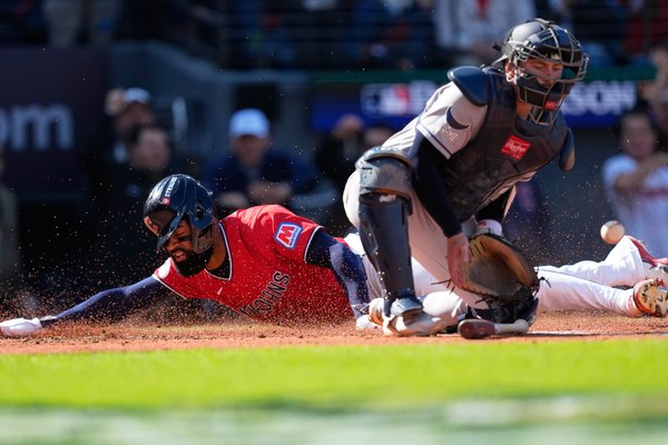 Jo Adell scores for the Cleveland Guardians against the Tampa Bay Rays in ALCS Game 3