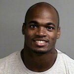 Adrian Peterson Turns Himself In