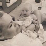 Pink Posts Breastfeeding Photo for "Normalization" of Human Experiences