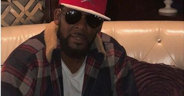 R Kelly Sued By Woman Claiming She Was Abused